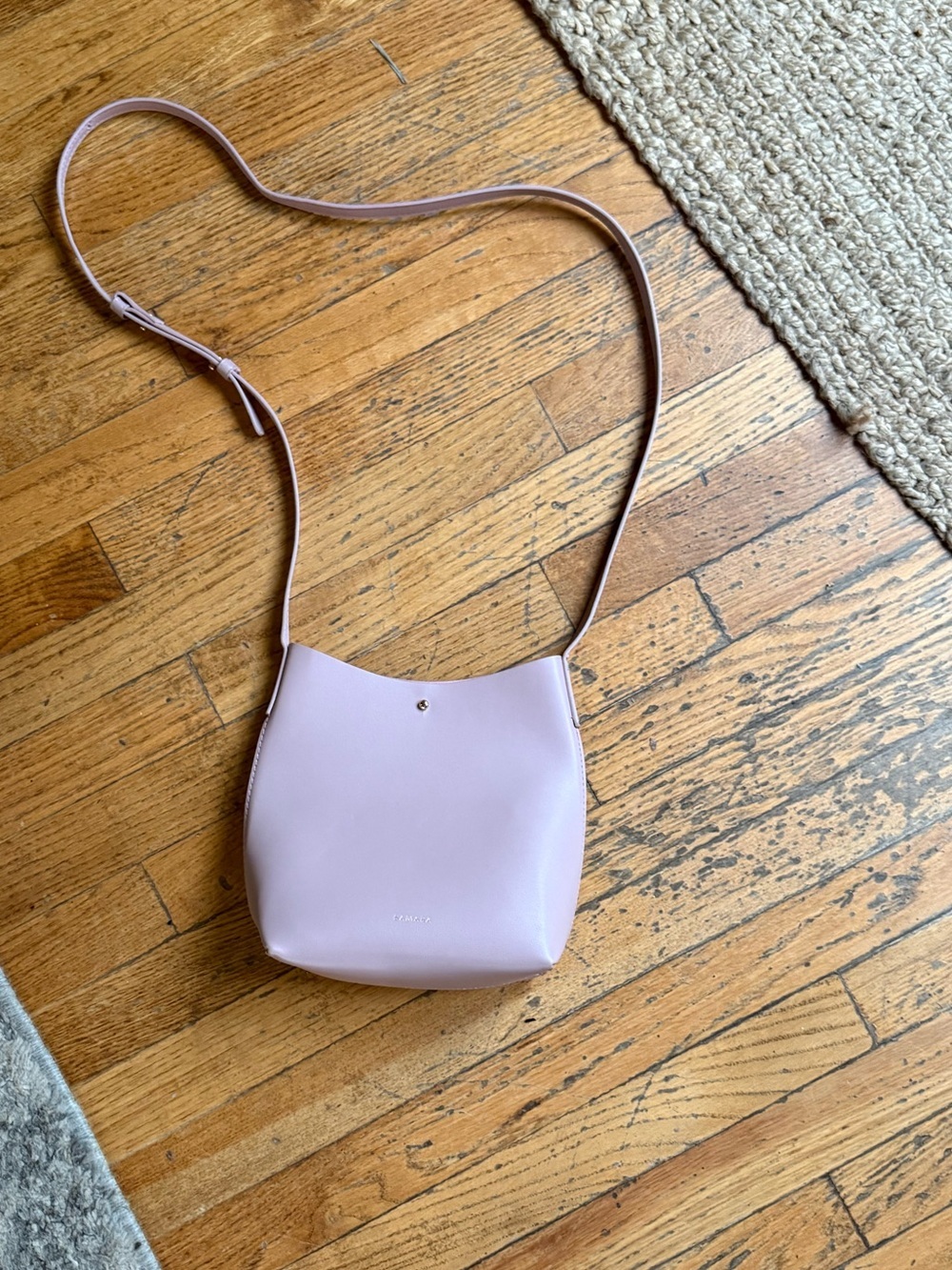 Samara peony blush vegan leather bucket bag sold at Anthropologie